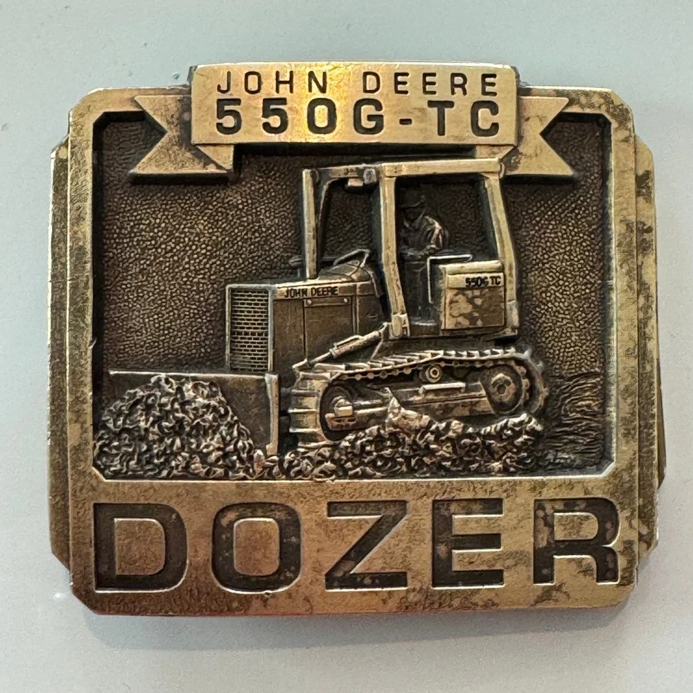 John Deere vintage brass